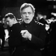Mark Hamill pointing at camera in a black-and-white shot from the premiere of Star Wars: The Rise of Skywalker.